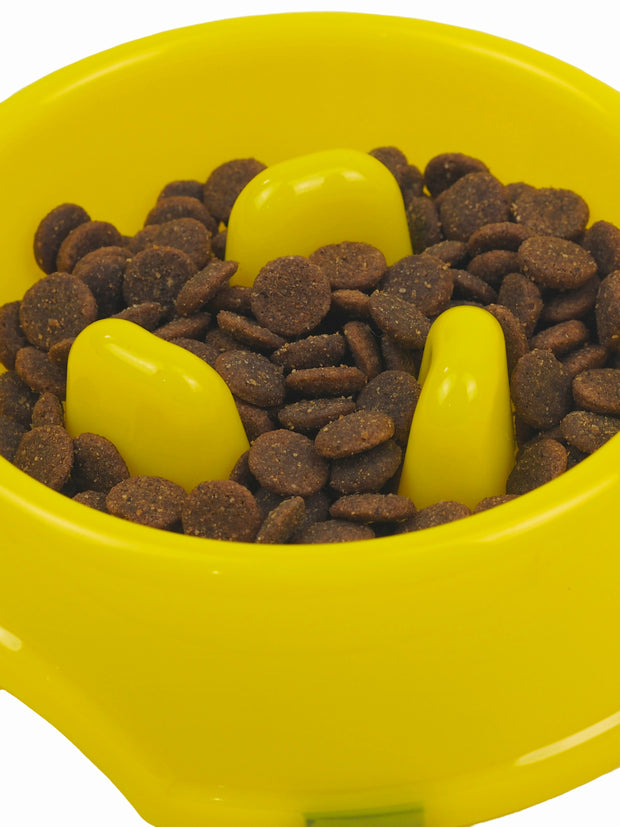 Interactive plastic dog food bowl